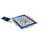 Scrabble board game with tiles and pieces on a white background