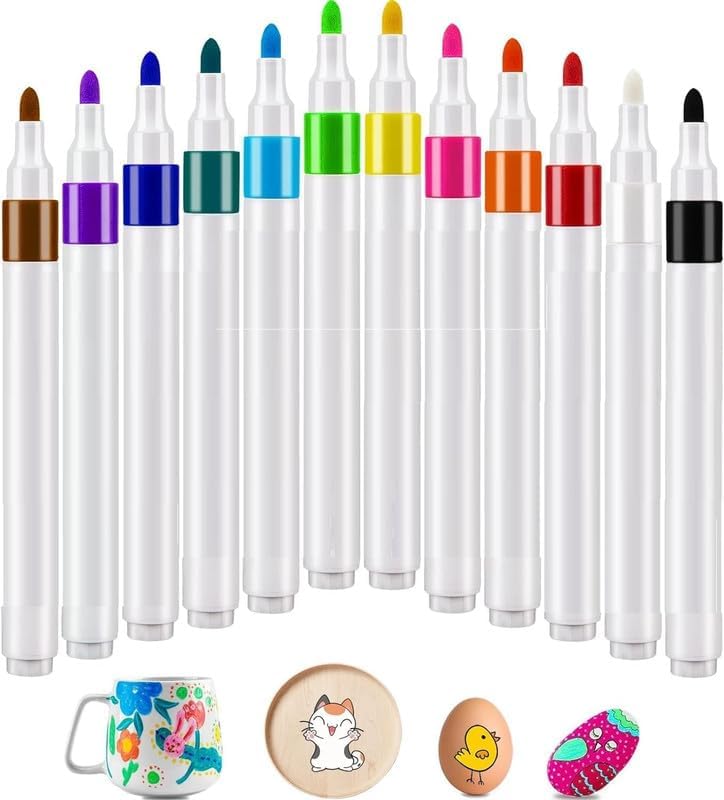 Set of colorful markers with a mug, stamp, and nail art design in the background