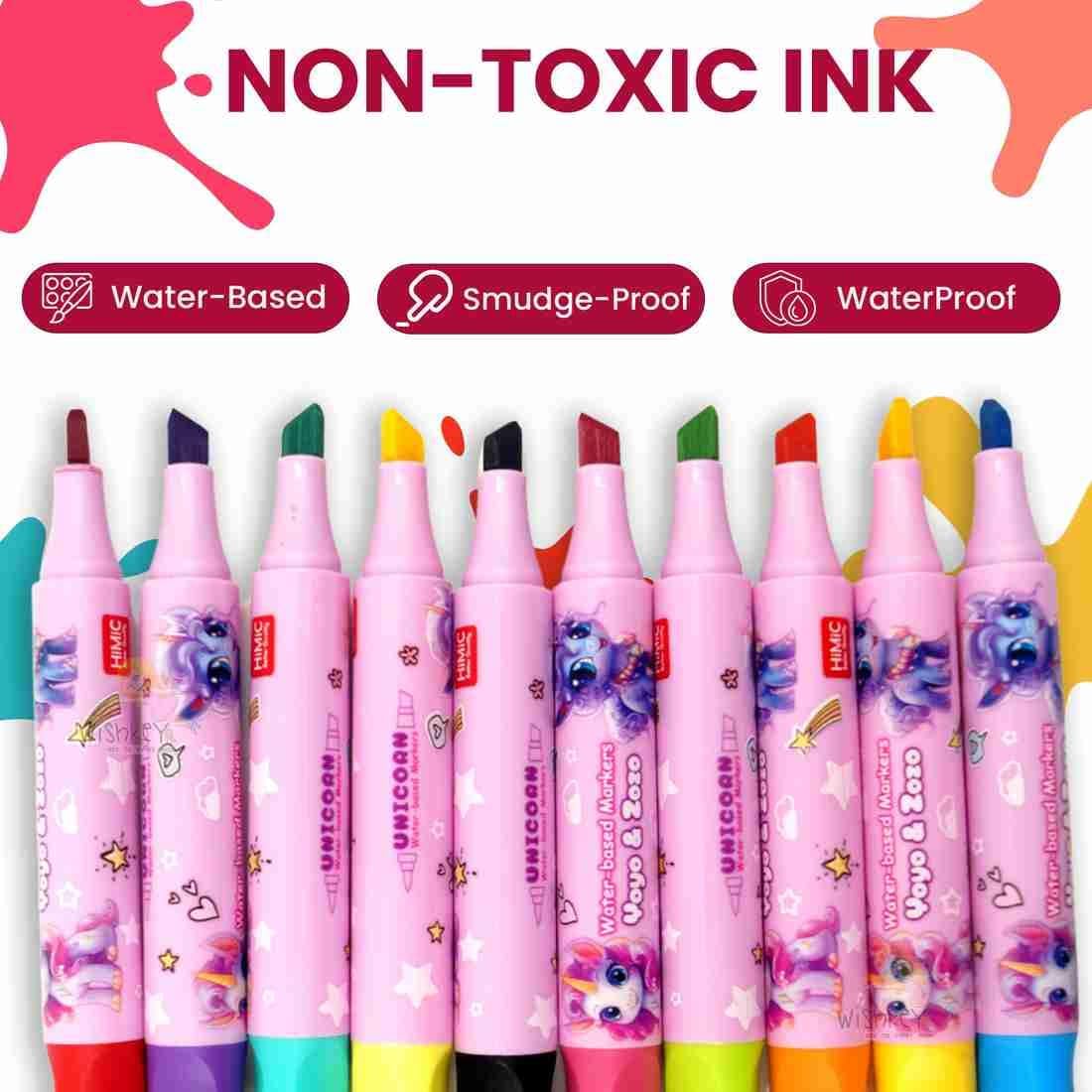 Set of colorful markers in a clear plastic holder on a white background