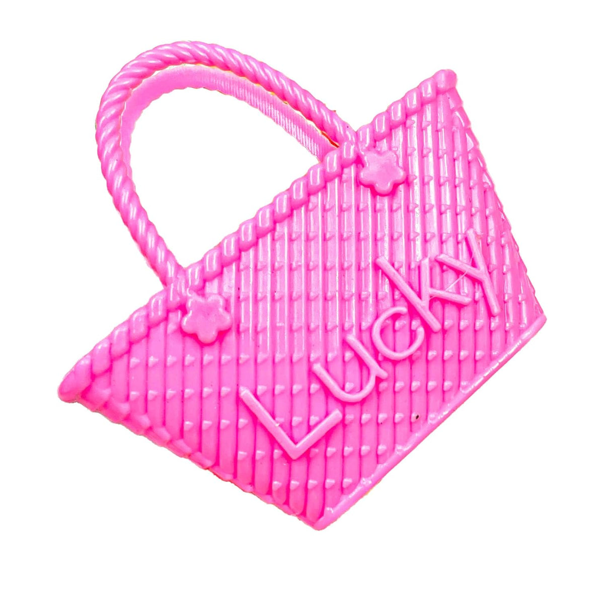 Pink dog toy shaped like a handbag with 'LUCKY' branding on a white background