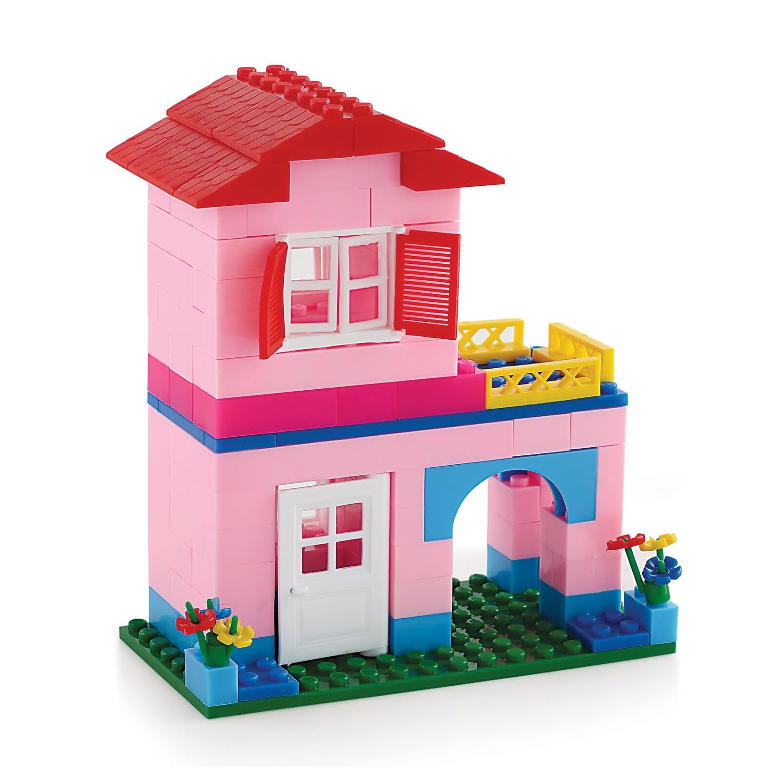 Toy house made of interlocking bricks on a white background