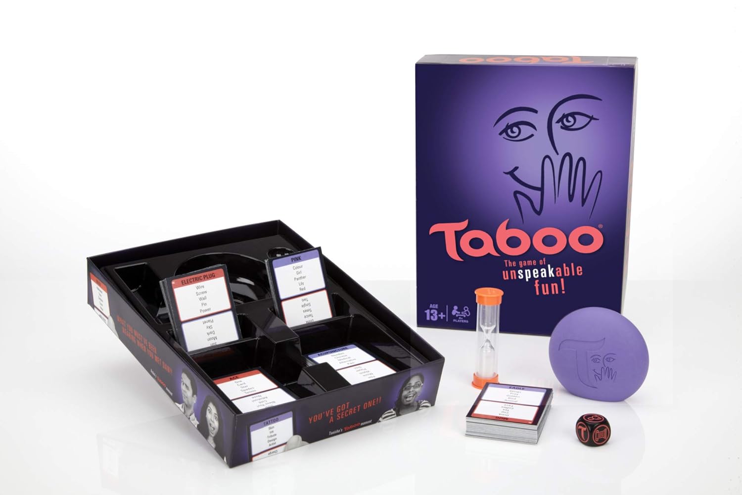 Taboo game set with cards, dice, and purple box on a white background