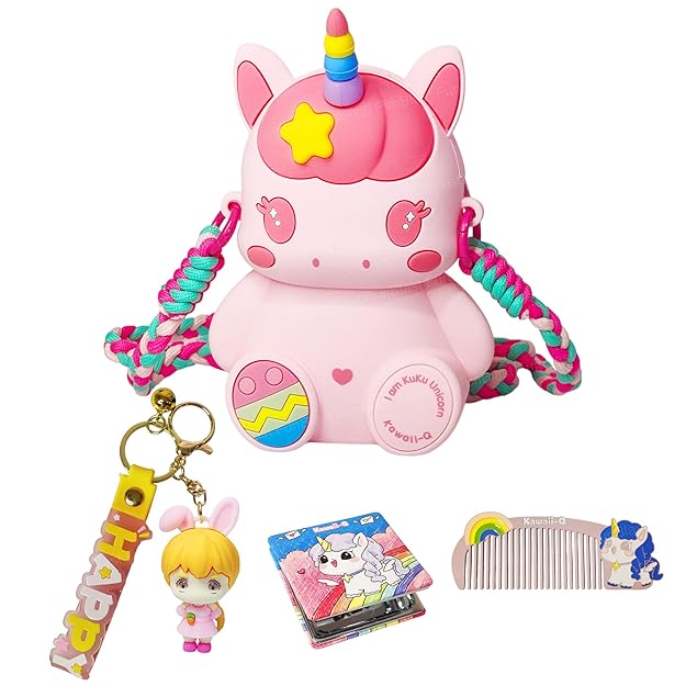 Pink unicorn-shaped toy with colorful strap, keychain, coloring book, and comb on a white background