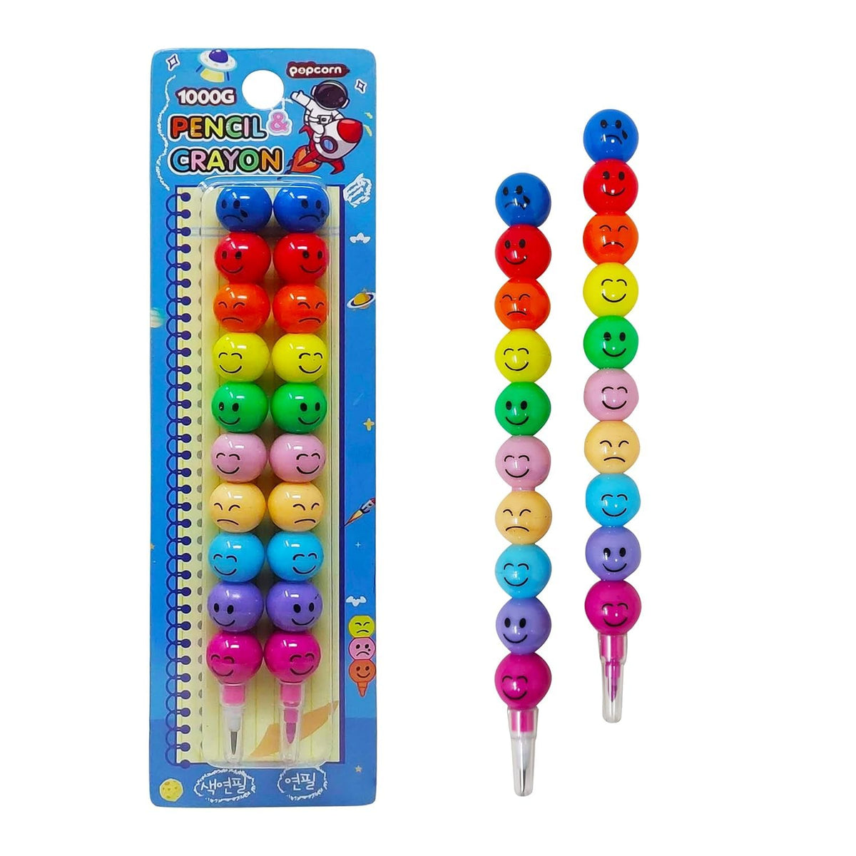 Colorful pencil crayon set with smiley face design and packaging on a white background