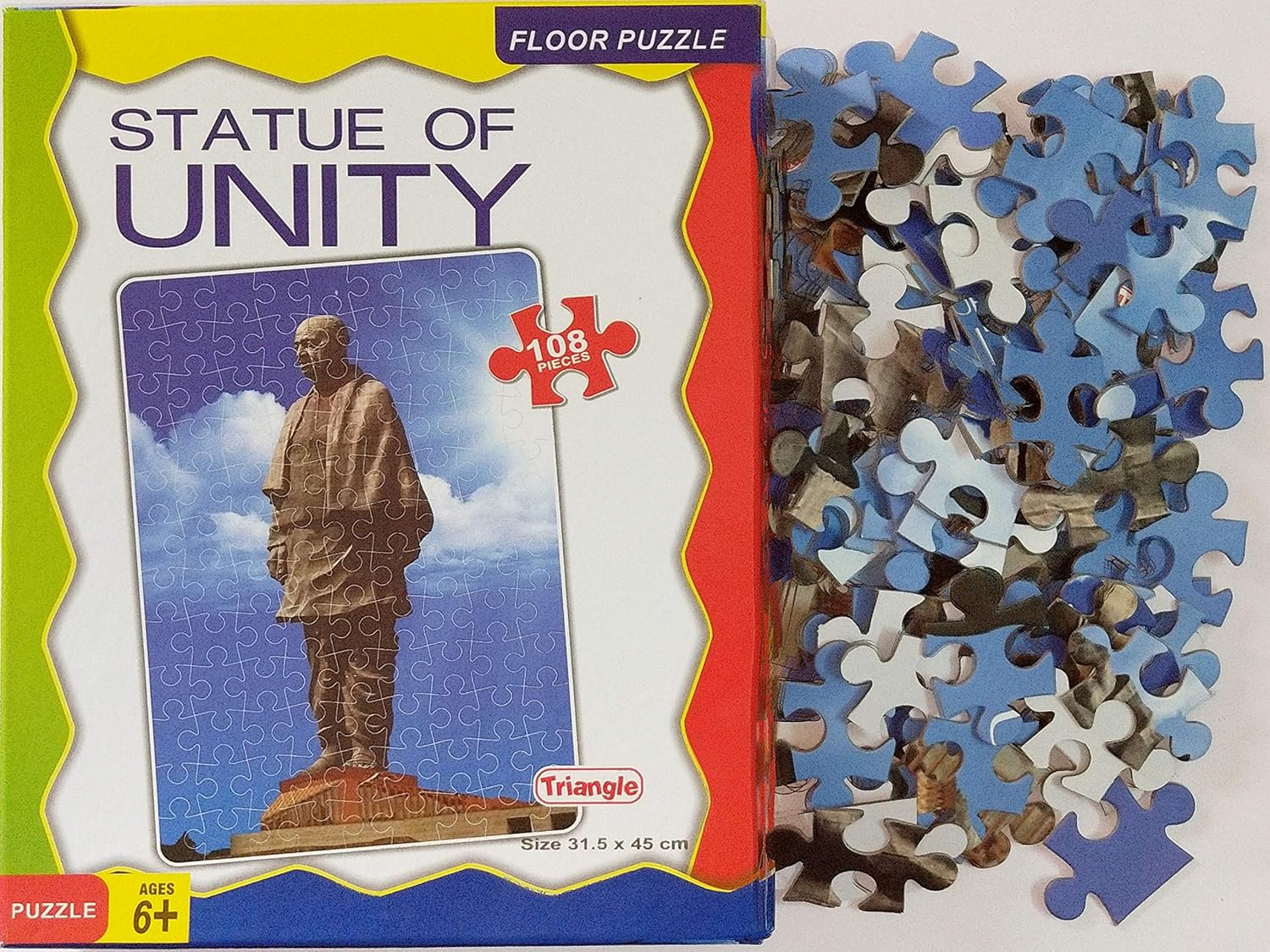Statue of Unity floor puzzle packaging with scattered pieces on a white background