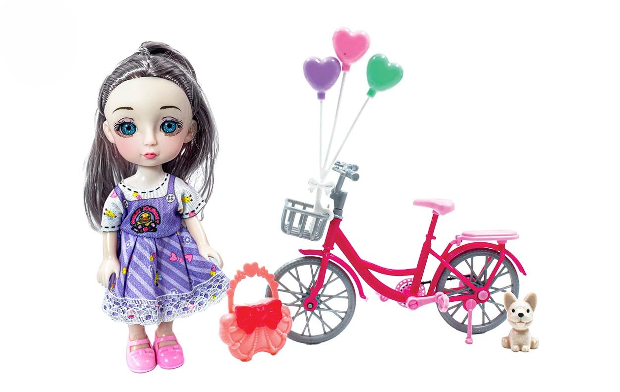 Doll with bicycle and dog toy on a white background