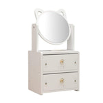 White vanity with a mirror on top against a white background