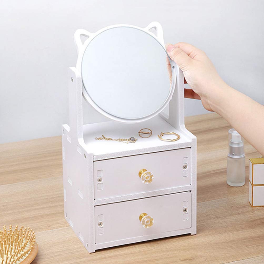 White jewelry box with a round mirror on top, held by a hand, on a wooden surface.