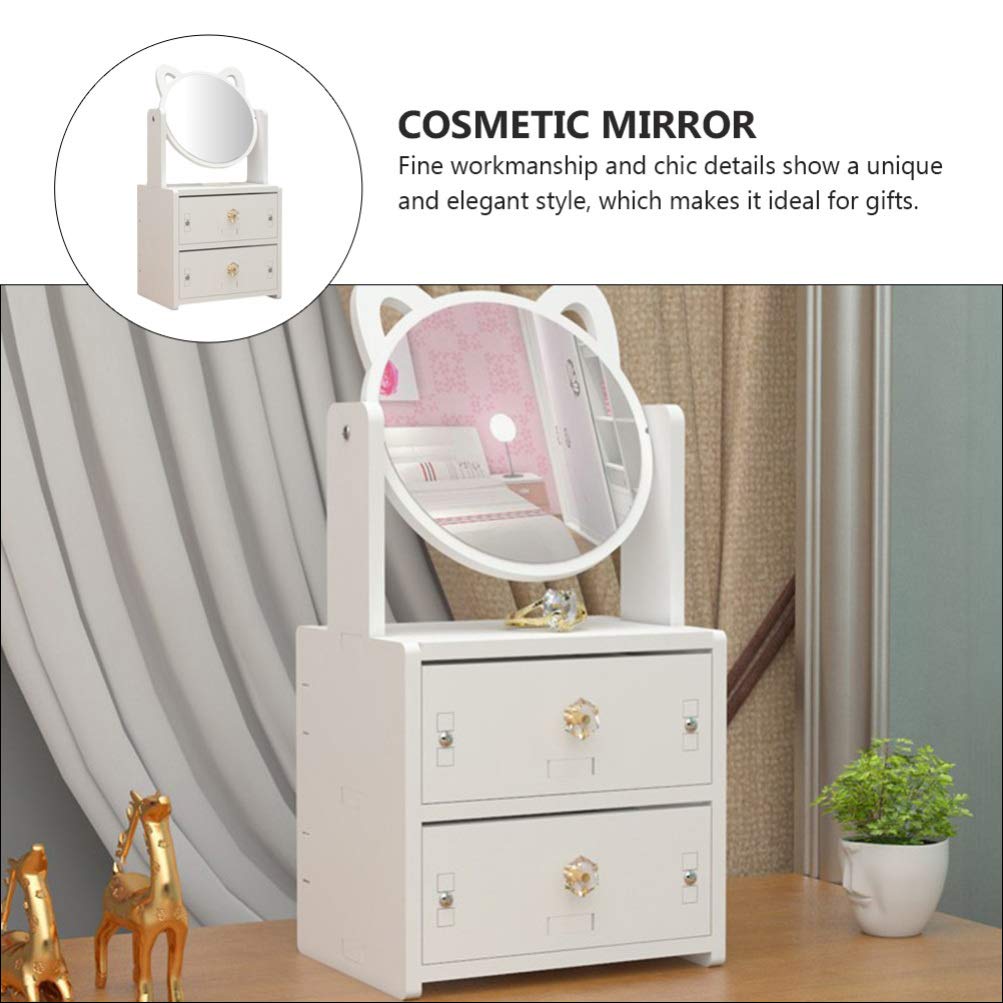 White cosmetic mirror with drawers on a wooden floor, surrounded by decorative items.