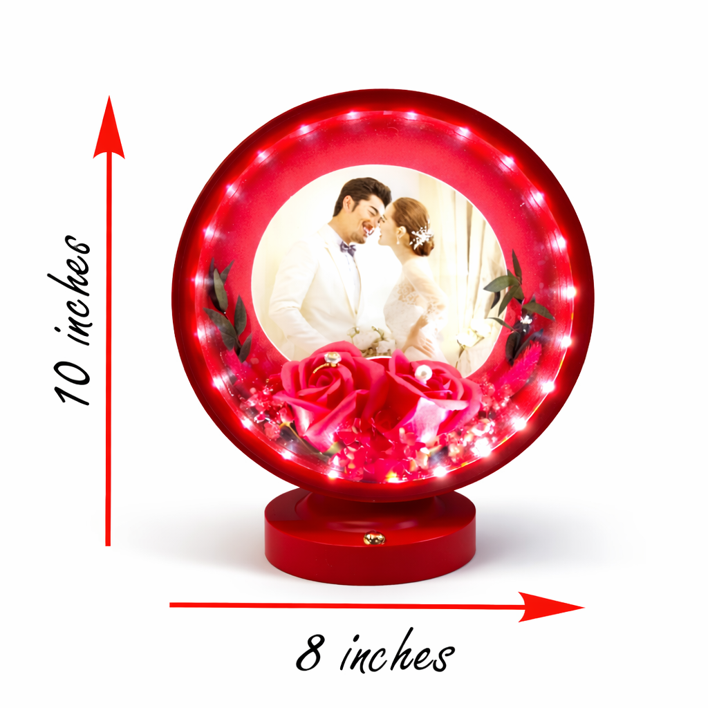 Decorative lighted globe with romantic design and measurements on a white background