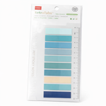 Packaged sticky notes with blue gradient colors on a white background