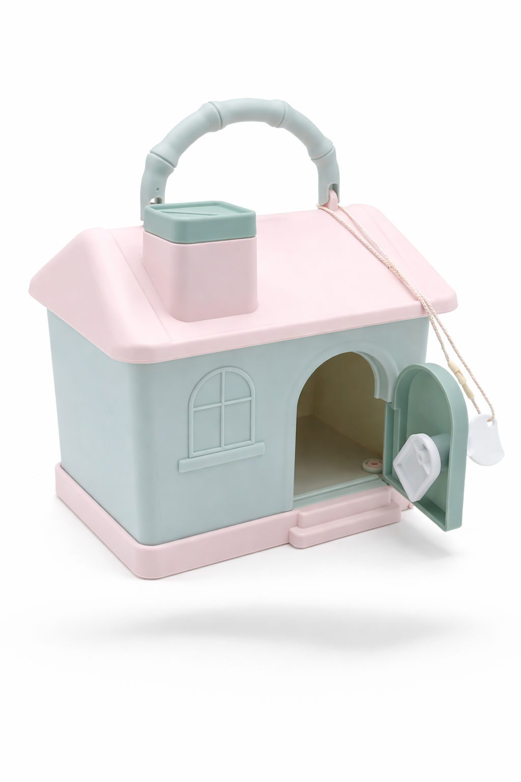 Pastel-colored toy house with a pink roof and open door on a white background
