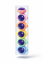 Colorful baby rattle set in a clear box on a white background