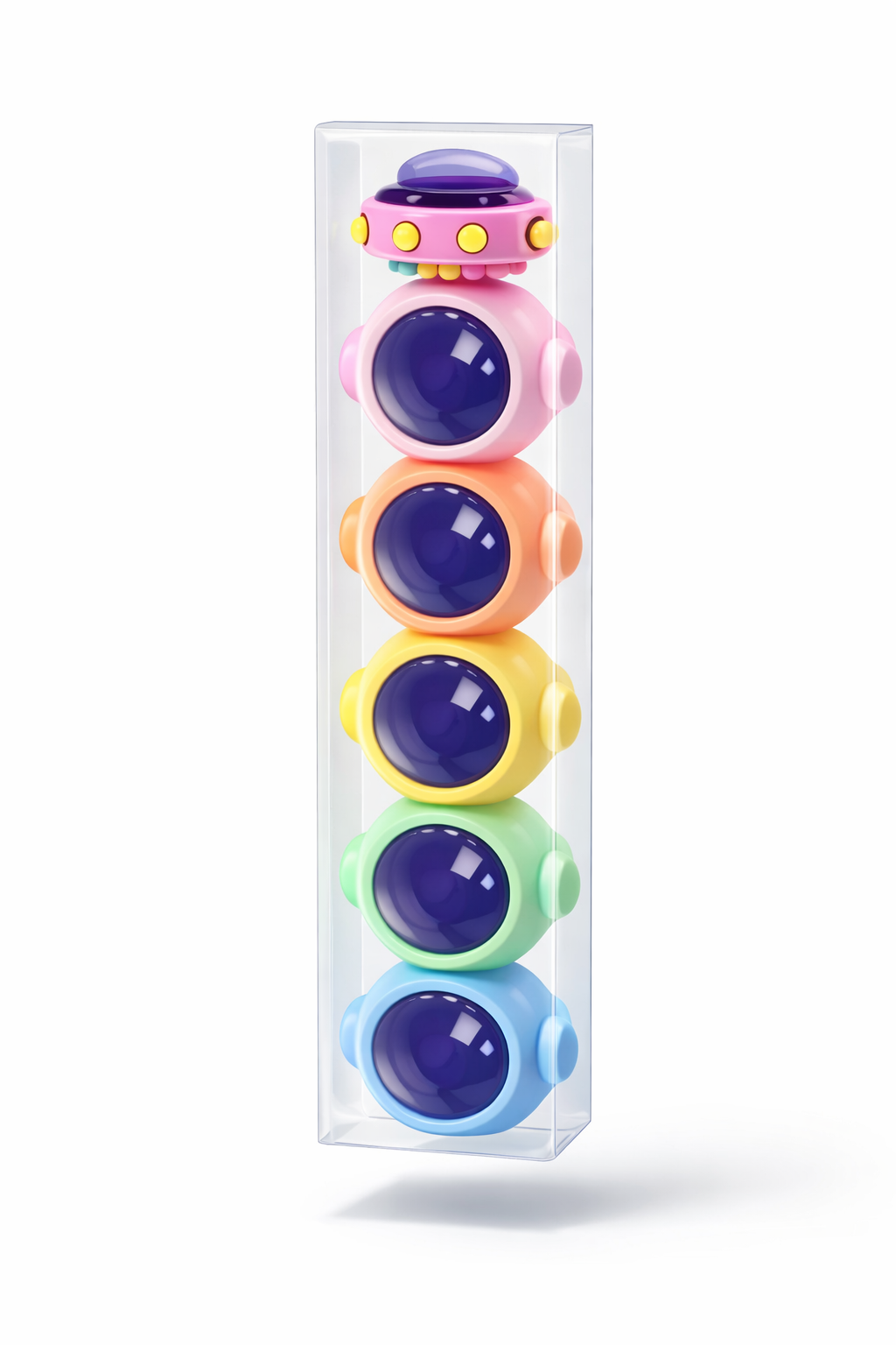 Colorful baby rattle set in a clear box on a white background