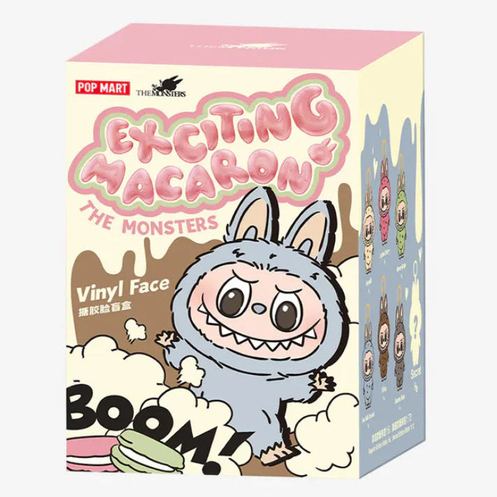 Box of 'Exciting Macaron' vinyl figures with cartoon character on a white background
