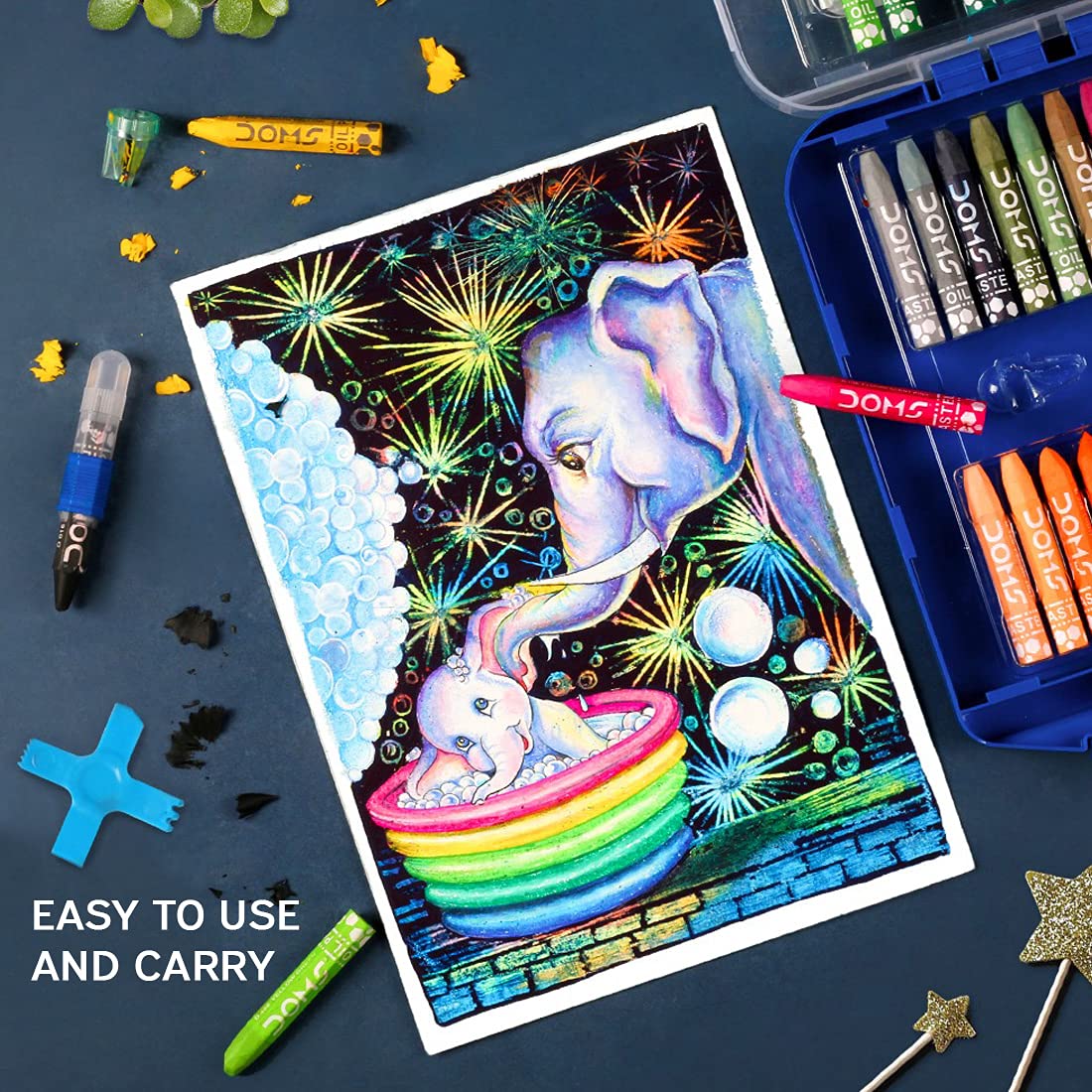 Coloring book with colorful elephants and art supplies on a dark surface