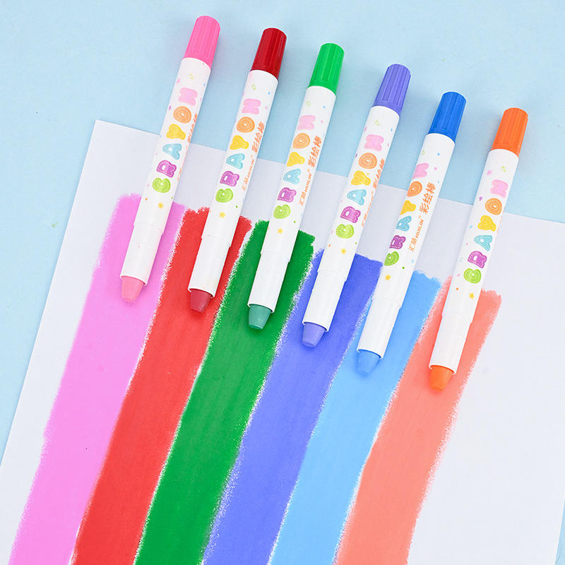 Set of colorful markers with colored caps on a light blue background