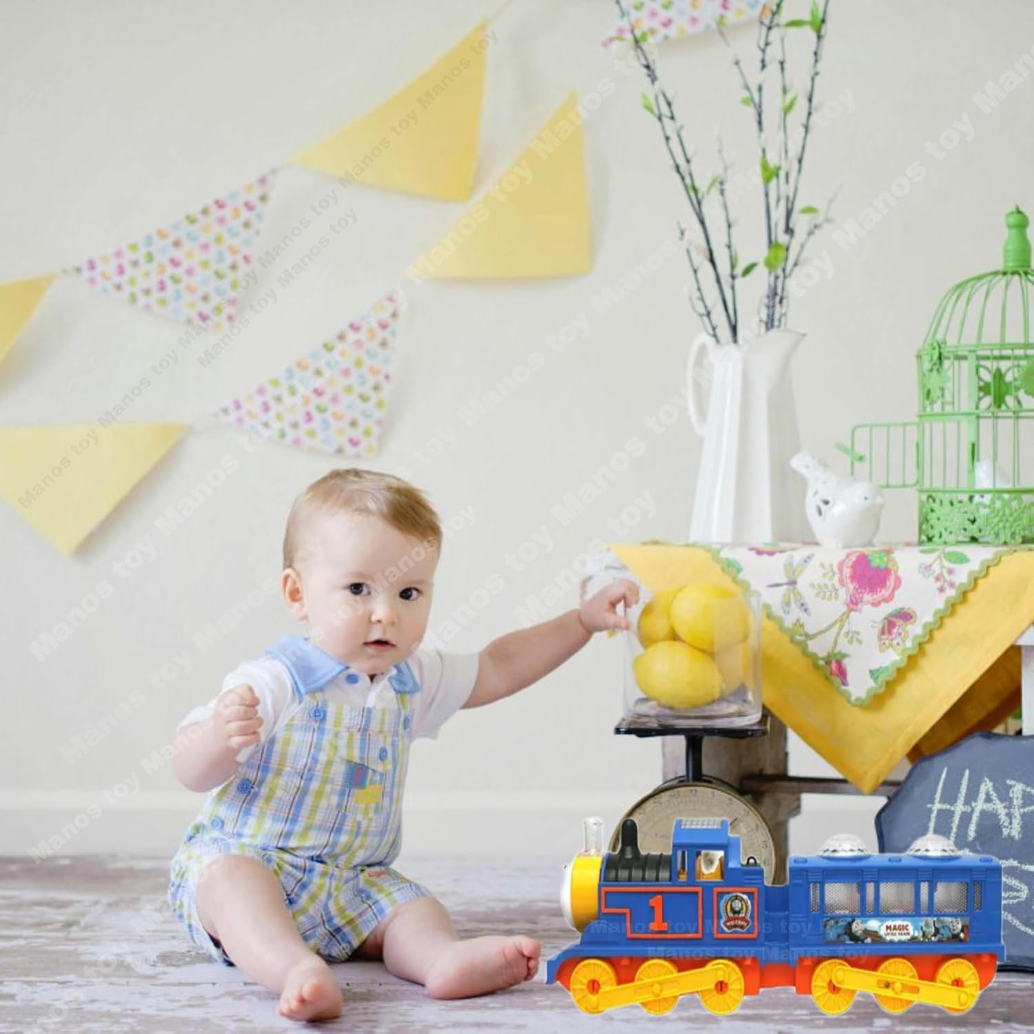 Baby playing with a toy train in a room with decorative elements
