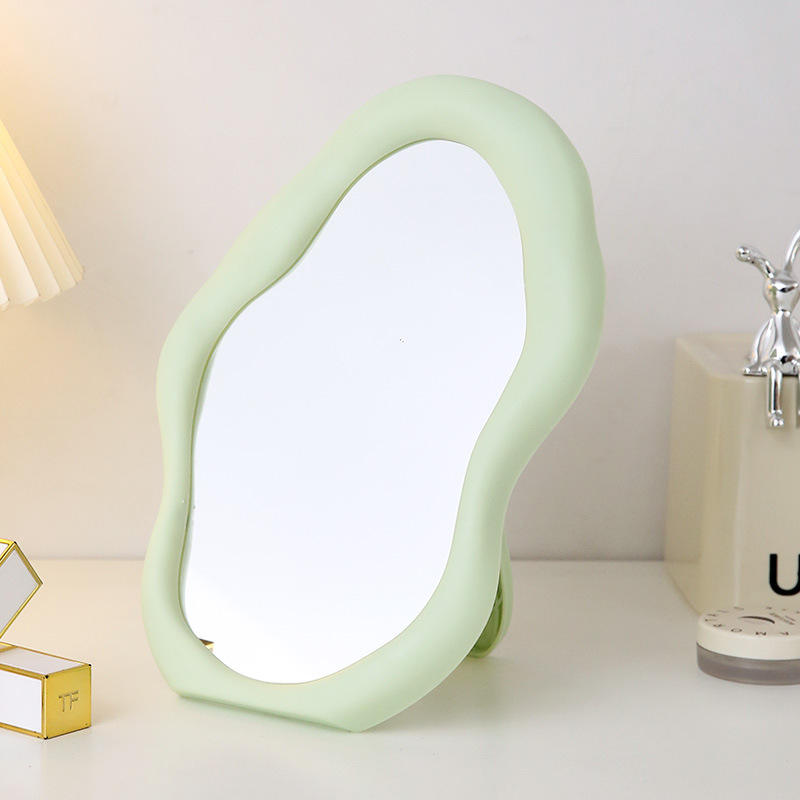Green lamp on a white surface with a blurred background