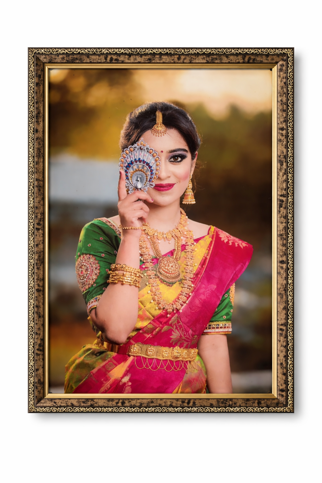 Woman in traditional attire holding jewelry with a decorative gold frame