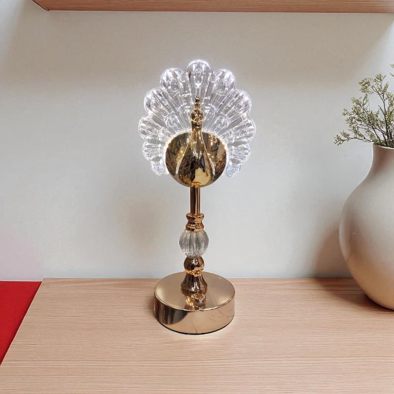 Decorative lamp with crystal design on a wooden surface