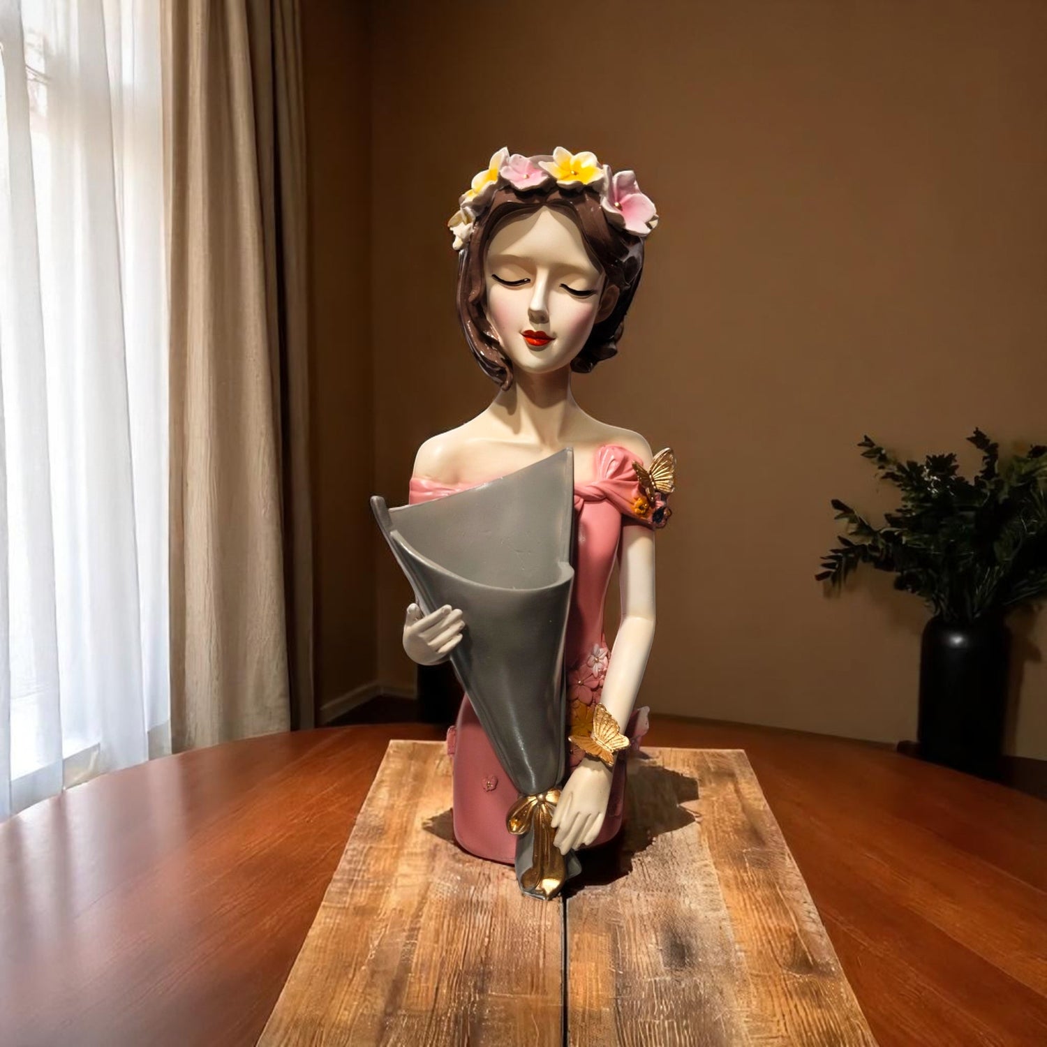 Front view of elegant lady bust holding bouquet – Dreamy Grace by Motumal Giftwala
