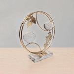 Elegantly Crafted Crystal Globe Leaf Circle Showpiece-motumal