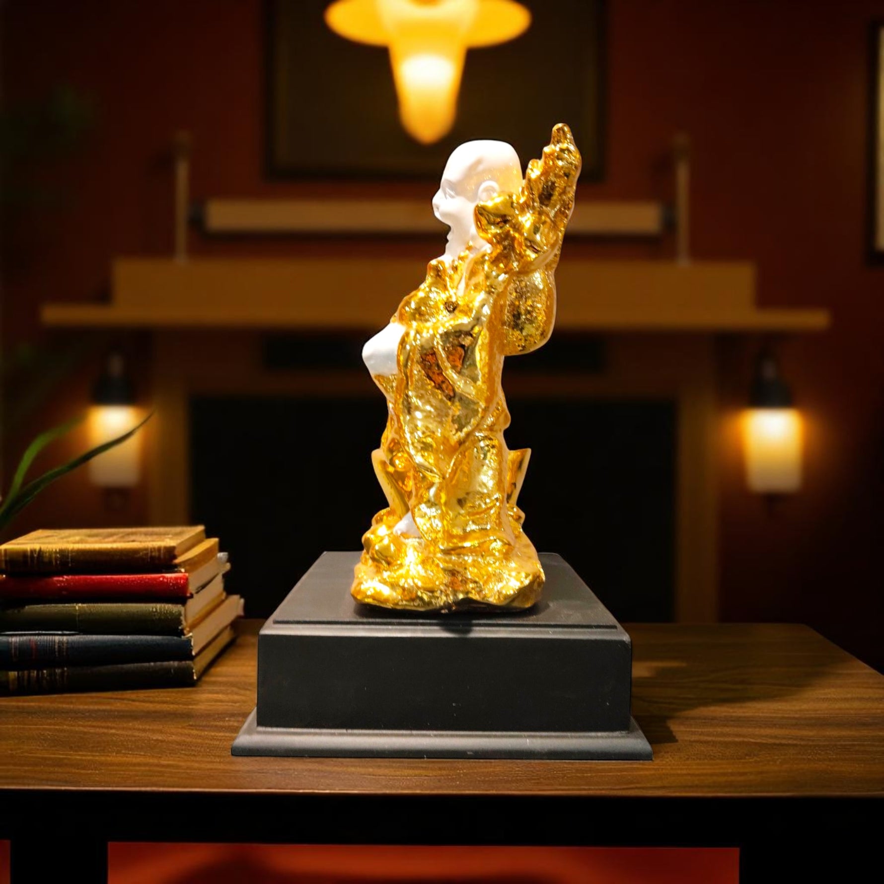 Side view of Buddha idol with golden details