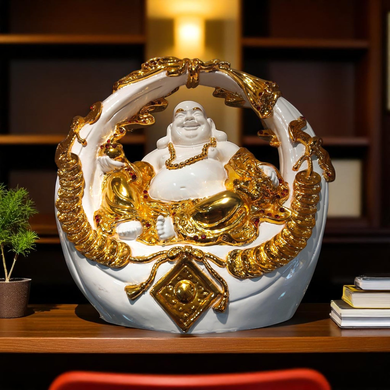 Front view of golden circular laughing Buddha showpiece from Motumal Giftwala