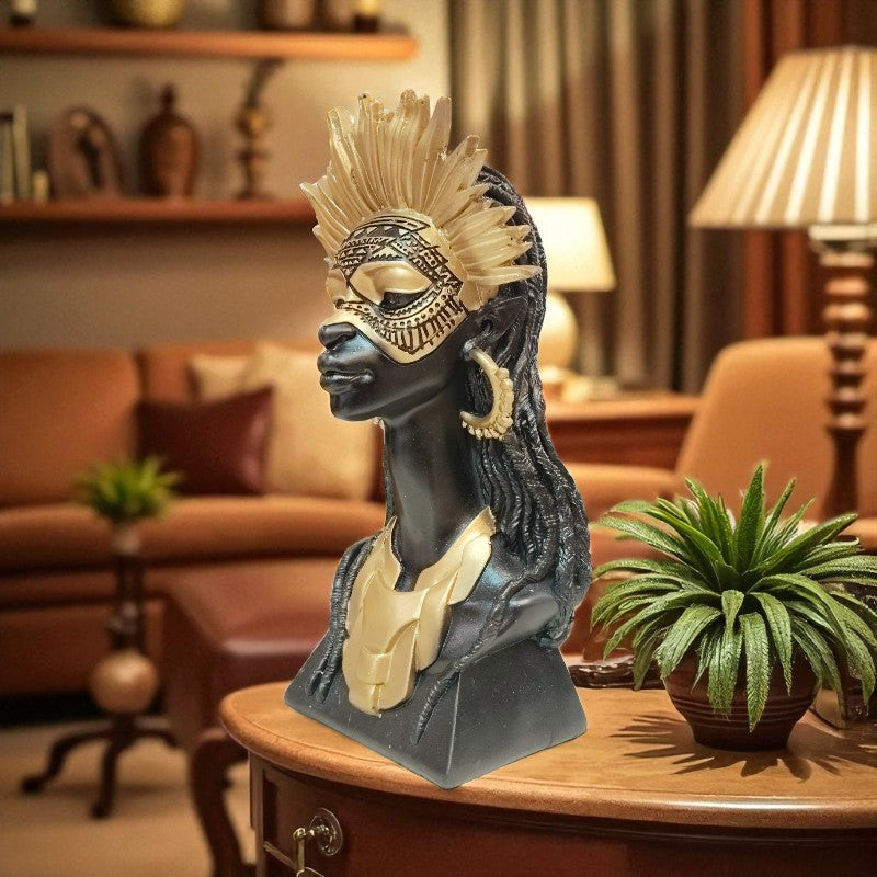 Decorative bust of a woman with a headdress on a table in a living room setting.