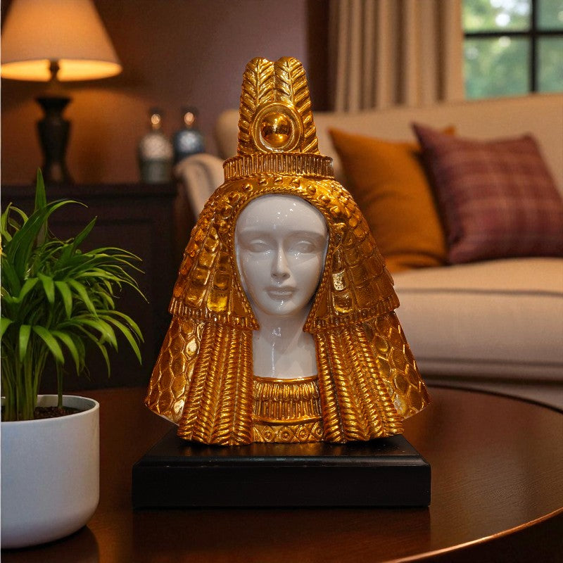 Decorative golden headpiece on a table in a living room setting