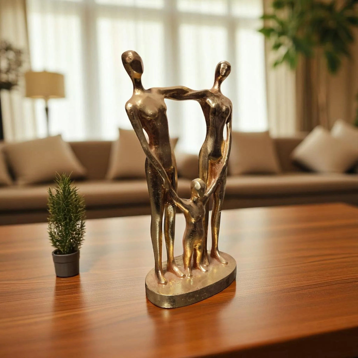 Golden Family Embrace Showpiece Handcrafted Resin Statue Motumal-motumal