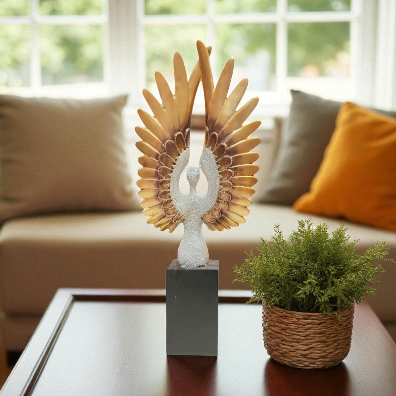 Decorative sculpture with sunflower-like wings on a table in a living room setting
