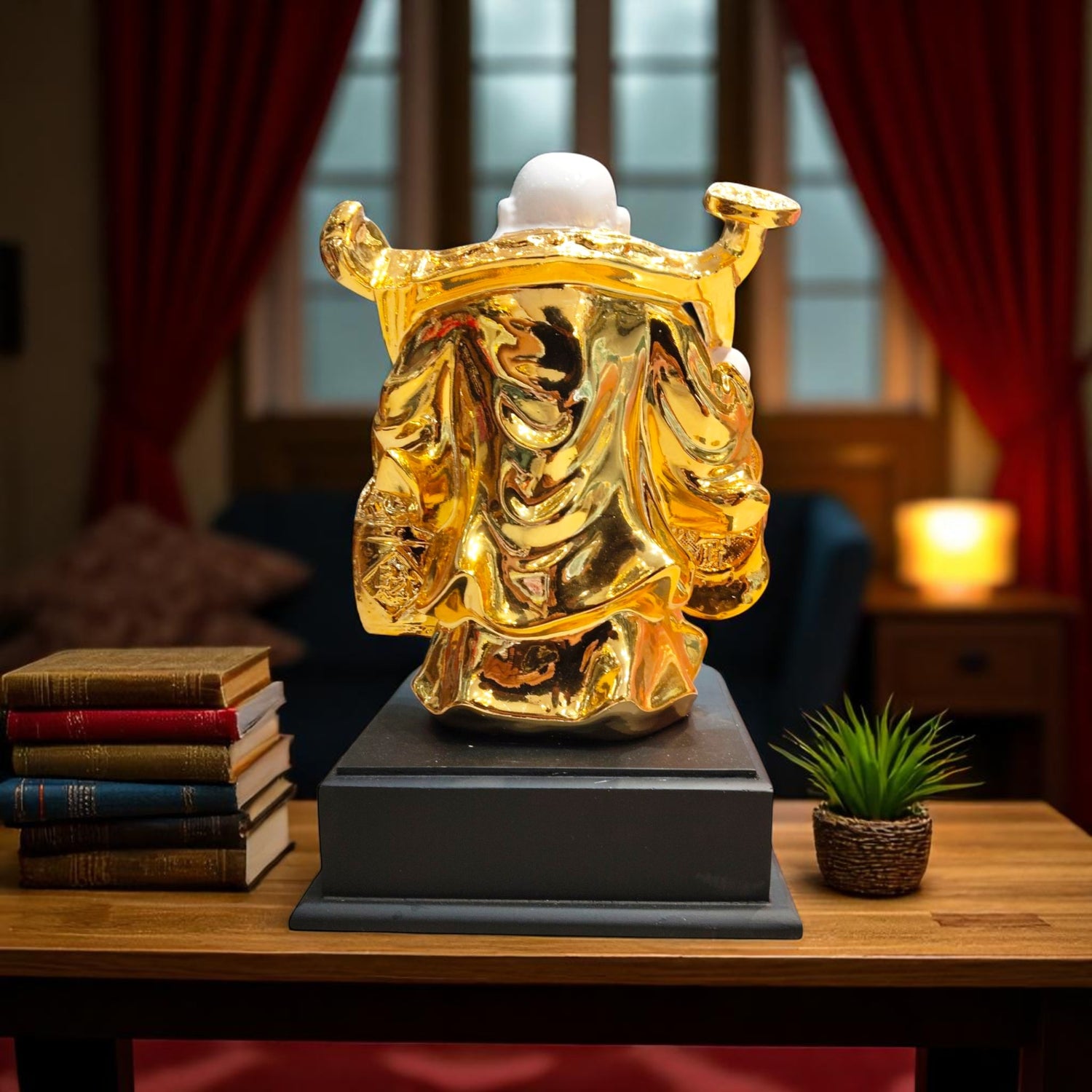 Side view of Golden Laughing Buddha figurine with double fish base