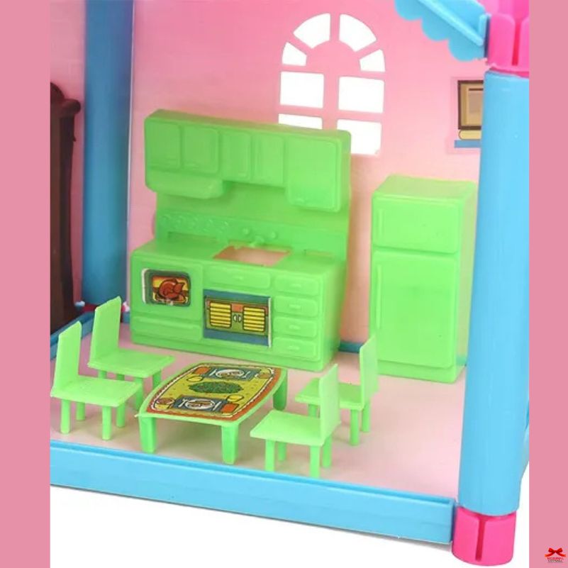 Toy kitchen set with green stove and chairs in a pink dollhouse.