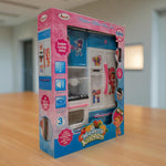 Angled side view of Modern Kitchen Playset box with pink and blue design, showcasing cabinets and stove.