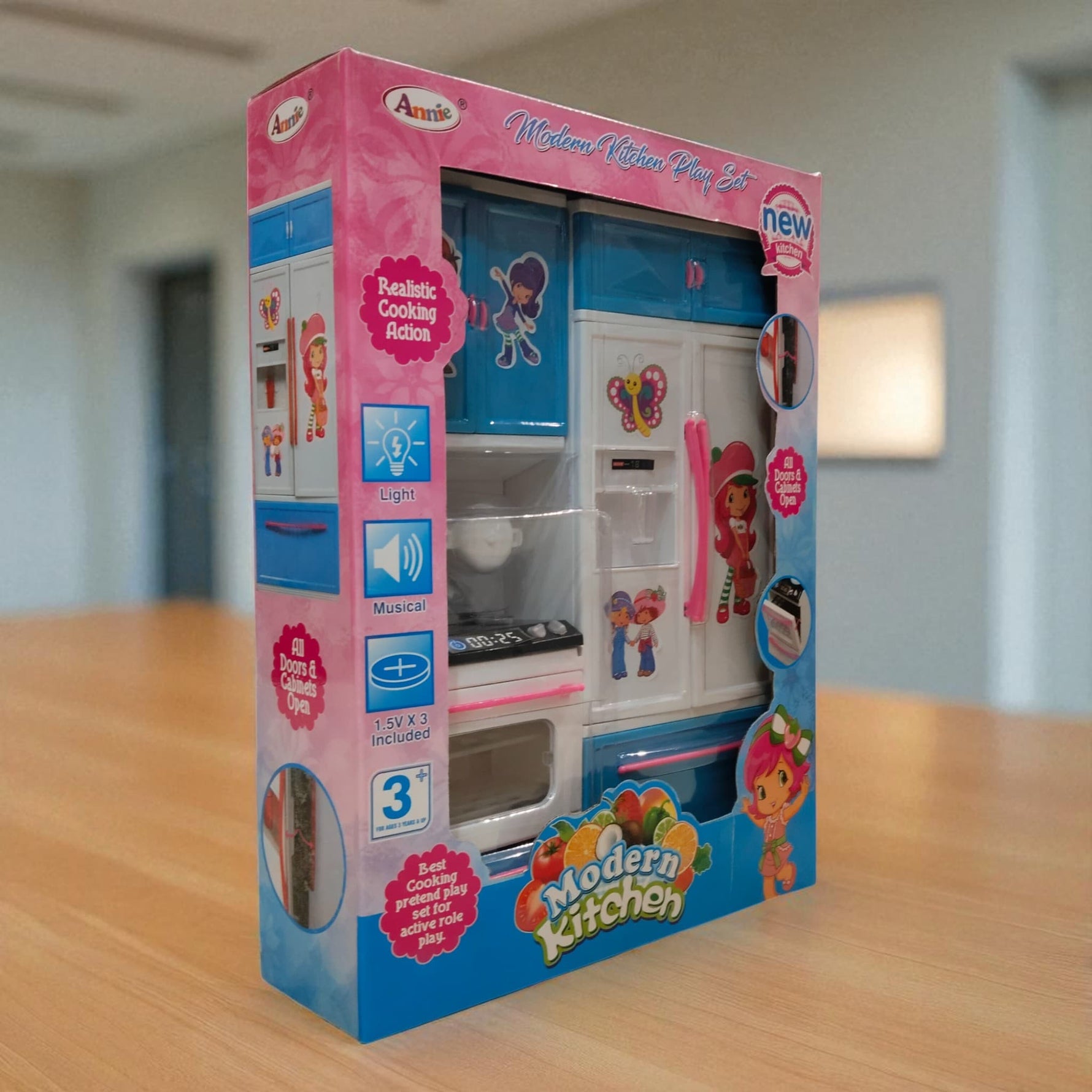 Angled side view of Modern Kitchen Playset box with pink and blue design, showcasing cabinets and stove.