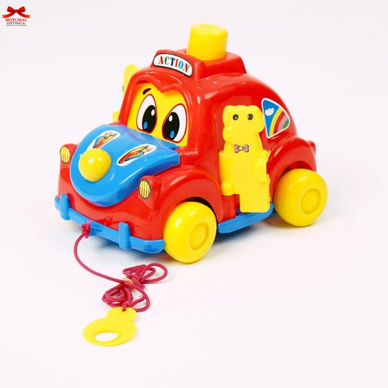 Colorful toy car with a pull string on a white background