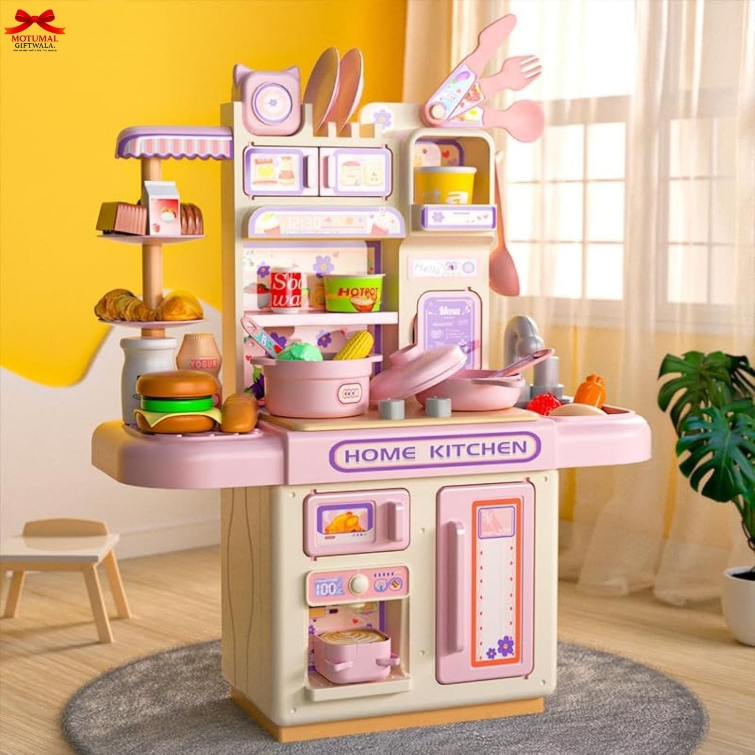 Children's toy kitchen set with various accessories in a room setting.