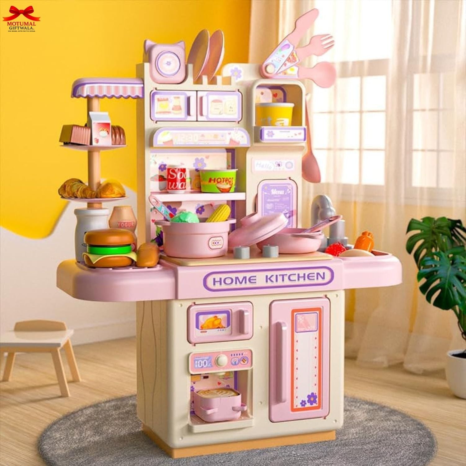 Children's toy kitchen set with various accessories in a room setting.