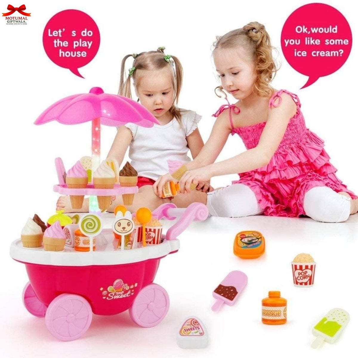 Two children playing with a toy ice cream cart and accessories on a white background