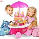 Two children playing with a pink toy ice cream cart on a white background