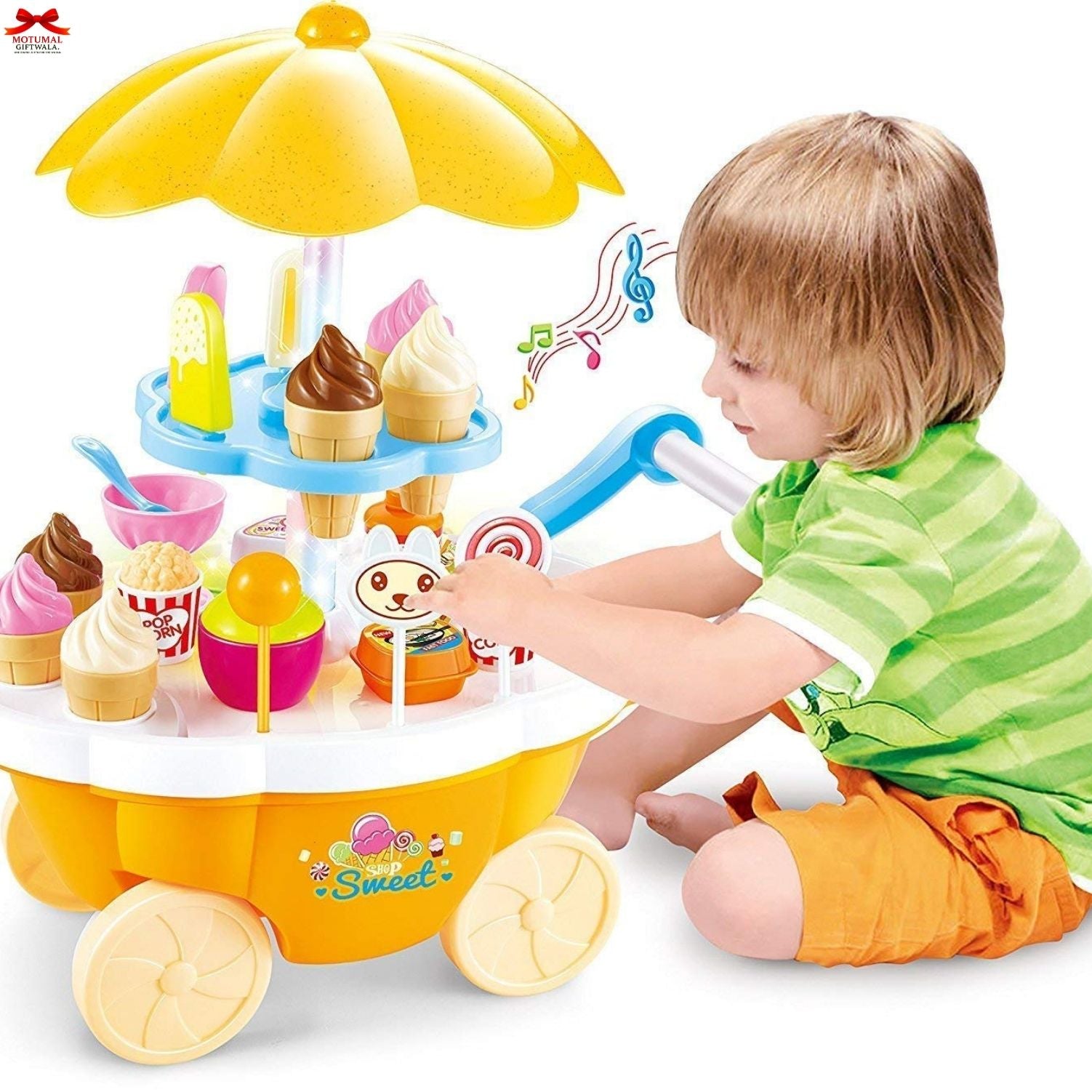 Child playing with a toy ice cream set on a white background