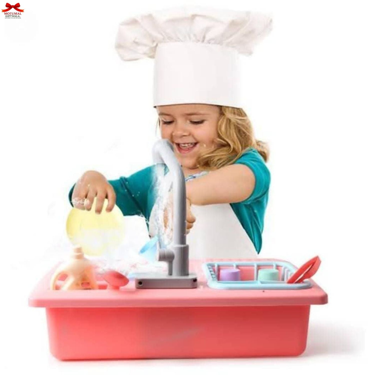 Child playing with a toy kitchen set on a white background