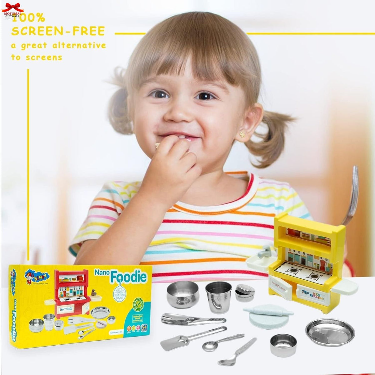 Child with toy kitchen set and packaging on a white background
