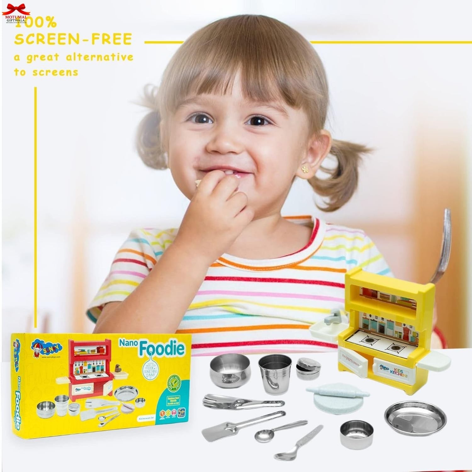 Child with toy kitchen set and packaging on a white background