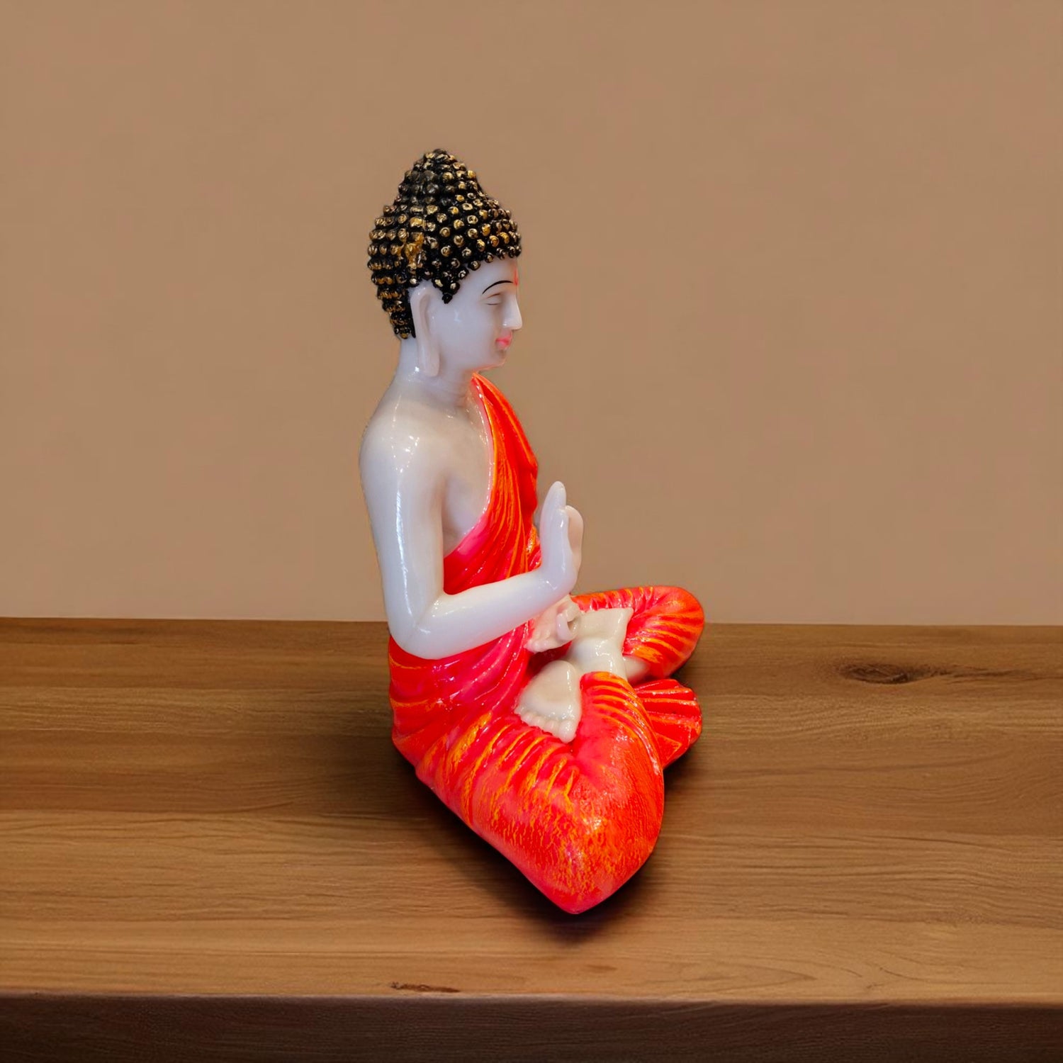 Peaceful Buddha showpiece in orange from side angle – Ranchi