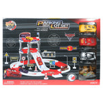 Toy parking lot set packaging with cars and track on a black background