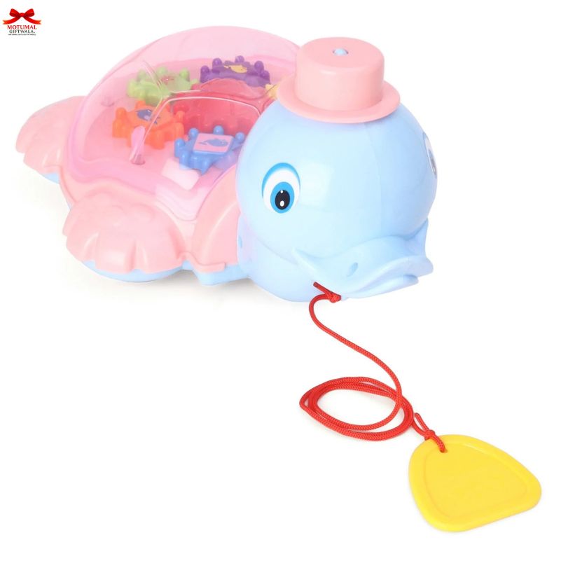 Colorful turtle-shaped toy with a string and yellow weight on a white background
