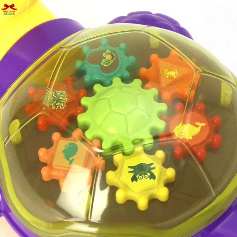 Colorful gear-shaped toys inside a transparent ball with a purple base.
